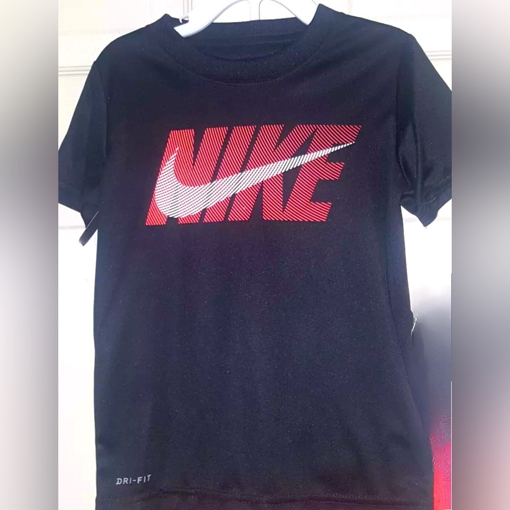 Nike black dri-fit graphic orange/white logo athletic short sleeve shirt size 5
